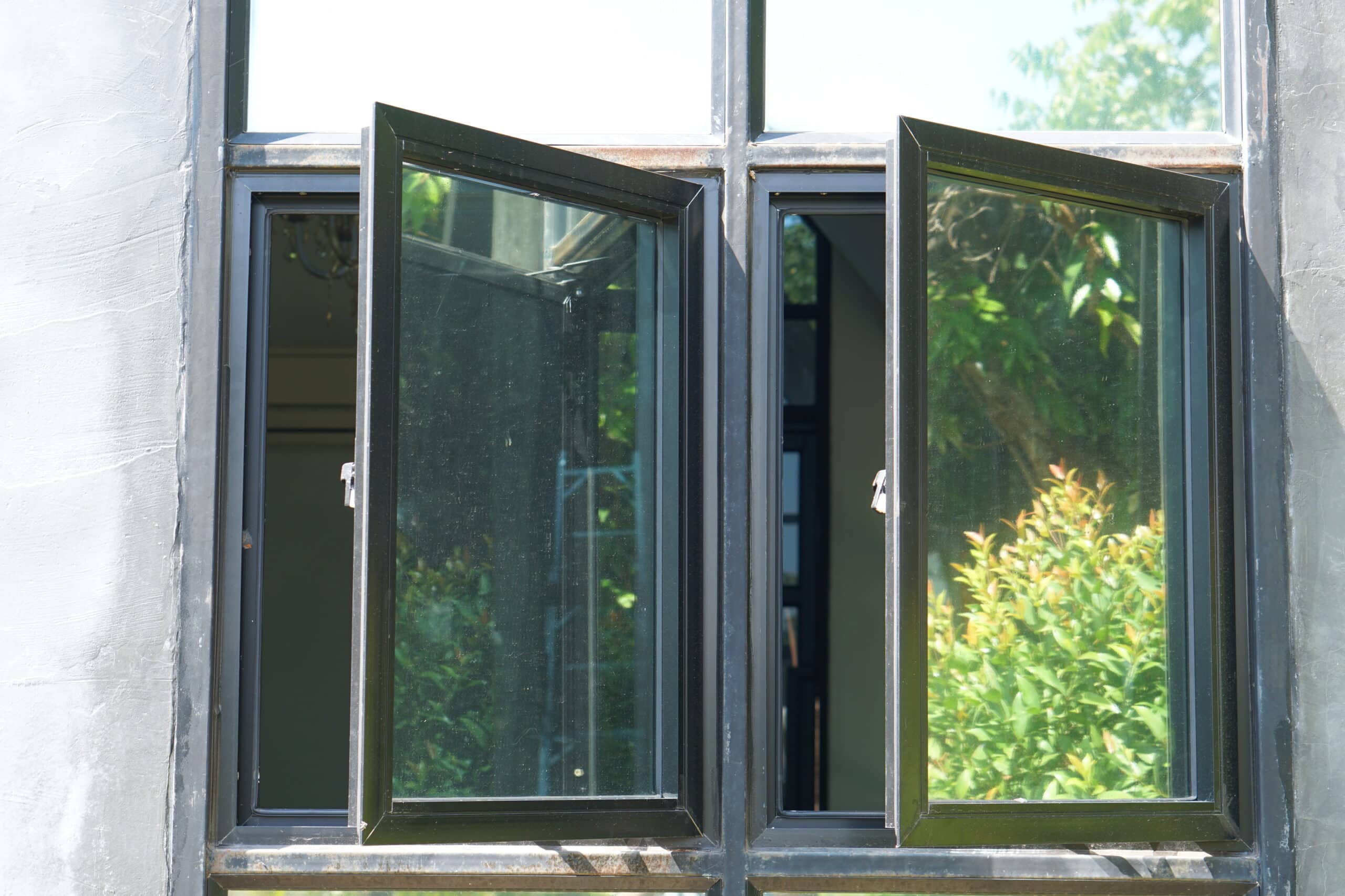 Two glass windows are opening.